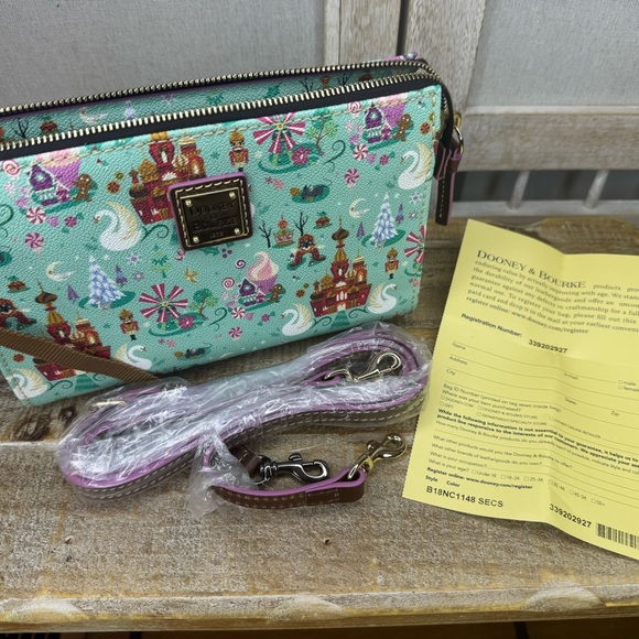 Dooney & Bourke Handbags - Dooney & Bourke Green Wristlet with Festive Print